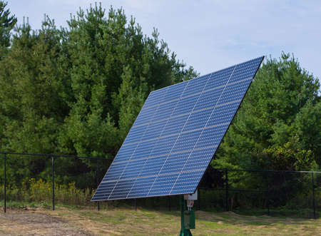 Solar panels mounted on rooftop and tracking mounts