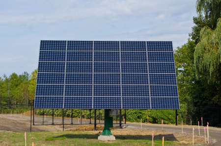 Solar panels mounted on rooftop and tracking mounts