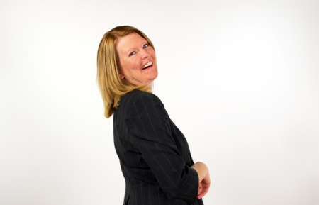 Blond business woman against white backgroundの写真素材