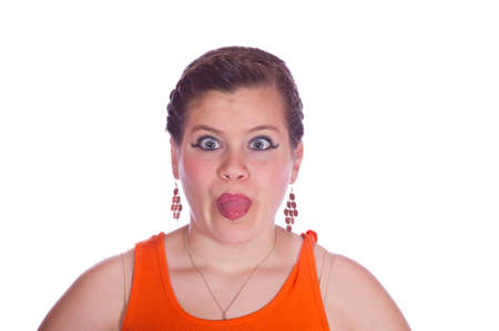 Teen girl making faces white backgroundの写真素材