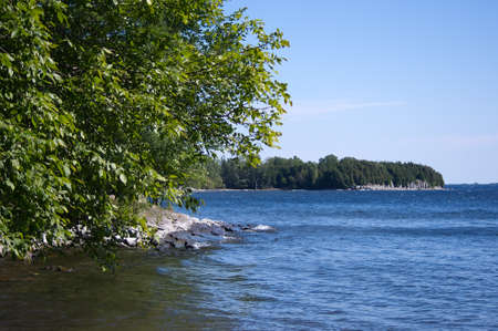 Overlooking a bay at Point Au Roche NYの写真素材