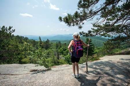 looking out at the view from the top of Poke-O-Moonshine mountainの写真素材