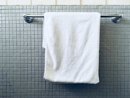 towel hanging on tile wallの写真素材