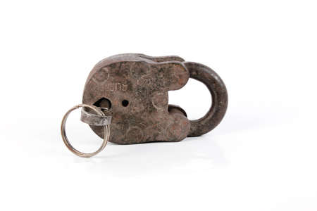 Old padlock and key  Isolated with clipping pathの写真素材