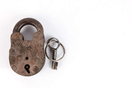 Old padlock and key  Isolated with clipping pathの写真素材
