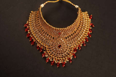Authentic Traditional Indian Jewellery Necklace On Dark Background. Wear in Neck in Wedding, Festivals And Other Occasion. Very Useful Image For Website, Printing & Mobile Application.の写真素材