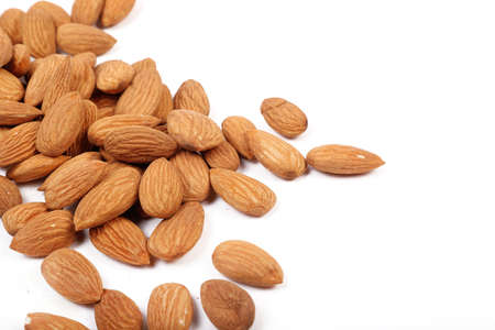 Group of almonds isolated on white.の写真素材