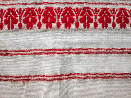 assamese gamosa ( gamusa , gamocha ) textile background ,gamusa pattern or gamosa border. gamosa is a traditional cloth of assam,north east.の写真素材