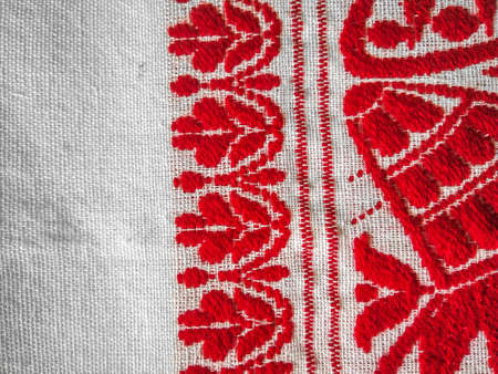 assamese gamosa ( gamusa , gamocha ) textile background ,gamusa pattern or gamosa border. gamosa is a traditional cloth of assam,north east.の写真素材