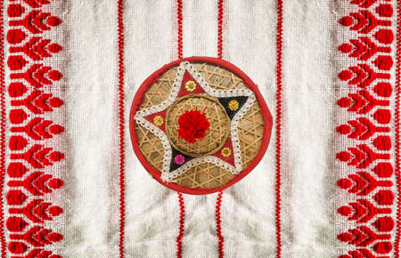 assamese gamosa ( gamusa , gamocha ) textile background ,gamusa pattern or gamosa border. gamosa is a traditional cloth of assam,north east.の写真素材