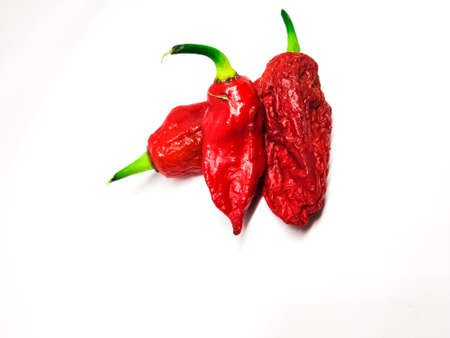bhut jolokia ghost pepper isolated on white background. fresh Carolina Reaper.の写真素材