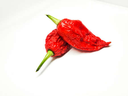 bhut jolokia ghost pepper isolated on white background. fresh Carolina Reaper.の写真素材