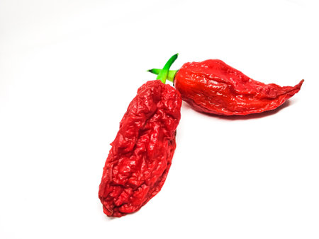 bhut jolokia ghost pepper isolated on white background. fresh Carolina Reaper.の写真素材