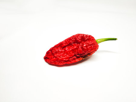 bhut jolokia ghost pepper isolated on white background. fresh Carolina Reaper.の写真素材