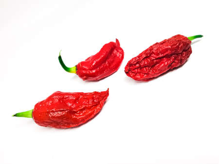 bhut jolokia ghost pepper isolated on white background. fresh Carolina Reaper.の写真素材