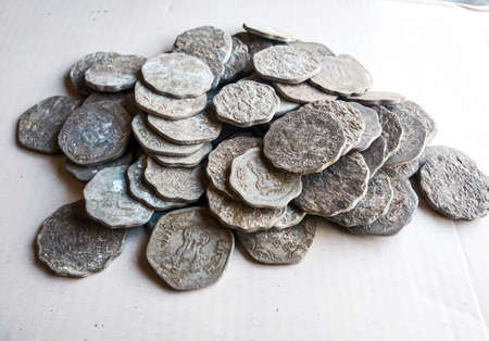 Ancient coins of the Roman Empire on the table, close-up