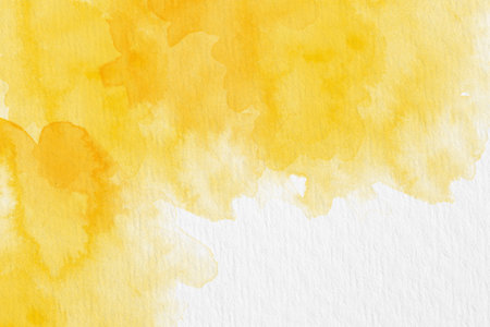 Abstract yellow watercolor on white paper background.The color splashing in the paper.It is a hand drawn.の写真素材