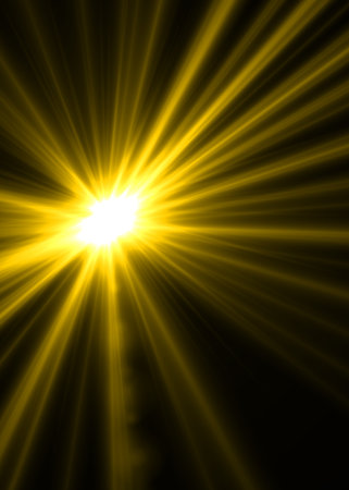 Abstract sun on a dark background with rays of light and lens flareの写真素材
