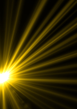 abstract sun with rays and sparkles on a black background.の写真素材