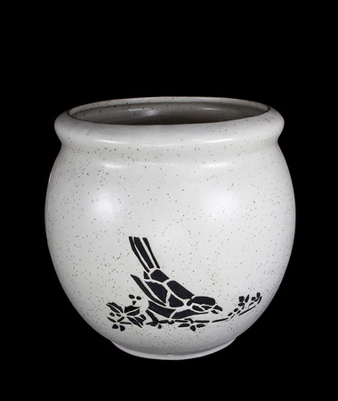 Round Ceramic Pot for plant flower with bird pattern on black backgroundの写真素材