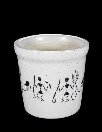 Round Ceramic Pot for plant flower with tribal pattern on black backgroundの写真素材