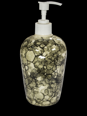 ceramic soap dispenser with hand painted grey patch patternの写真素材