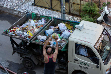 Jodhpur, Rajashtbn, India. 20th April 2020 , People dropping their garbage bag to van during the...