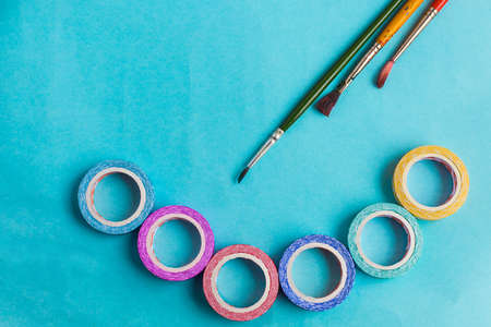 Three painting brushes along with six colorful tapes, art and craftの写真素材