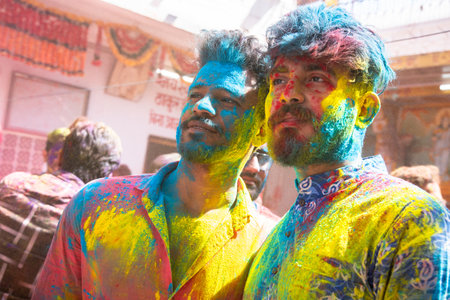 Jodhpur, rajastha, india - March 20, 2020: Group of young indian people celebrating holi festival, men face smeared with colored powder.のeditorial素材