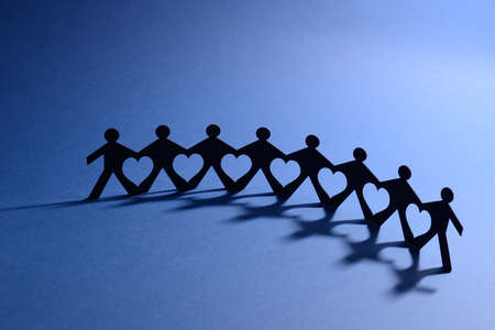 chain of people figure with hearts between 