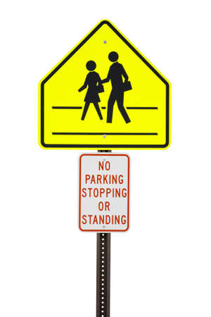 Yellow Cross walk sign cut out against whiteの写真素材