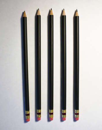 One different pencil among normal pencilsの写真素材
