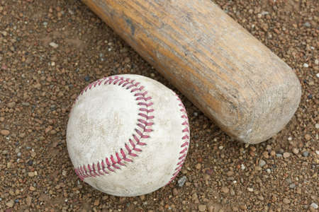 A baseball and a baseball batの写真素材