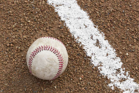 An old worn baseballの写真素材