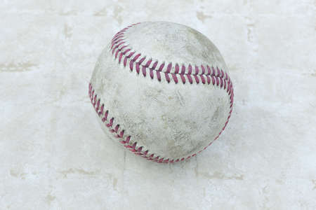 An old worn baseballの写真素材
