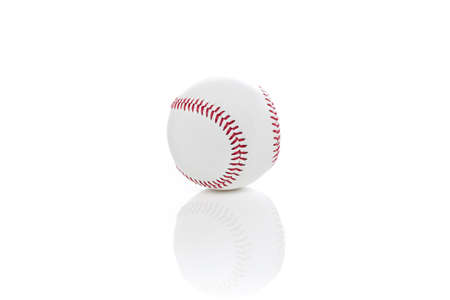 A clean white baseball against a white backgroundの写真素材
