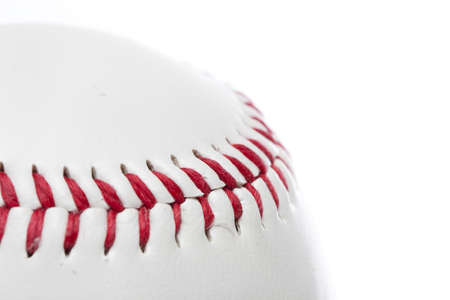 A clean white baseball against a white backgroundの写真素材