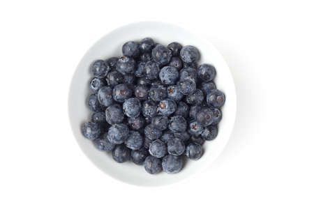 Fresh blueberries against a white backgroundの写真素材