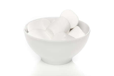 A large white marshmallow against a white backgroundの写真素材
