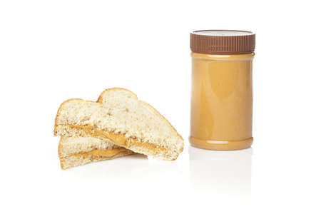 A peanut butter sandwhich against a white backgroundの写真素材