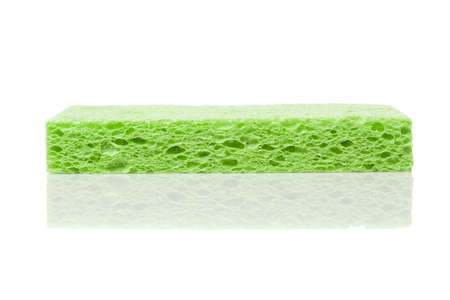 A colorful sponge used for cleaning against a white backgroundの写真素材