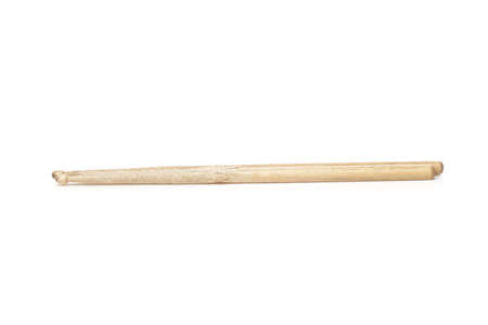 Wooden drum sticks against a white backgroundの写真素材