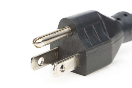 A black power cable against a white backgroundの写真素材