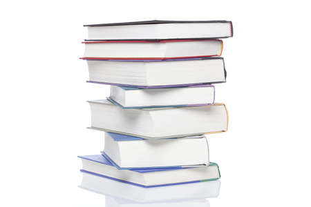 A group of books against a white backgroundの写真素材