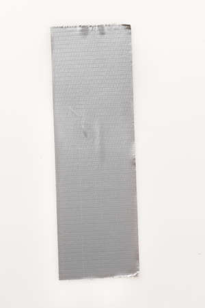 Silver duct tape on a white backgroundの写真素材
