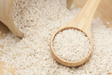 A heap of Healthy Dry Brown Rice ready to cookの写真素材