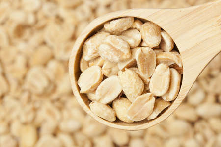 Fresh Dry Organic Peanuts against a backgroundの写真素材