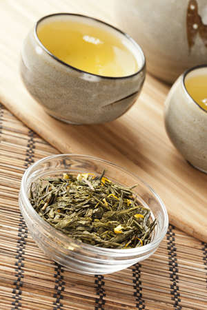 Organic Green Tea in a ceramic bowlの写真素材