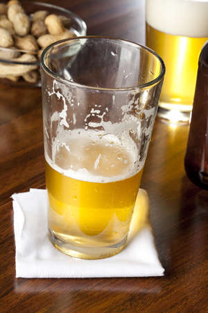 Refreshing Empty Beer Glass against a background
