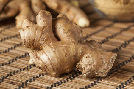 Fresh Organic Oriental Ginger on a backgroundの写真素材